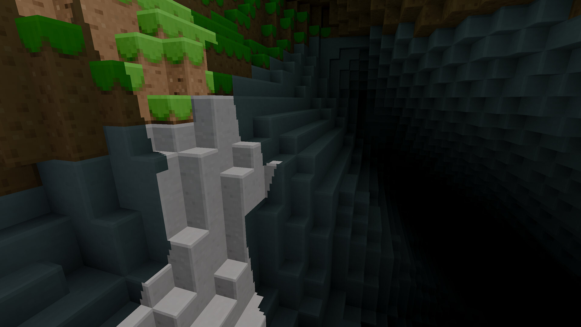 A patch of sunlight shines into a cave