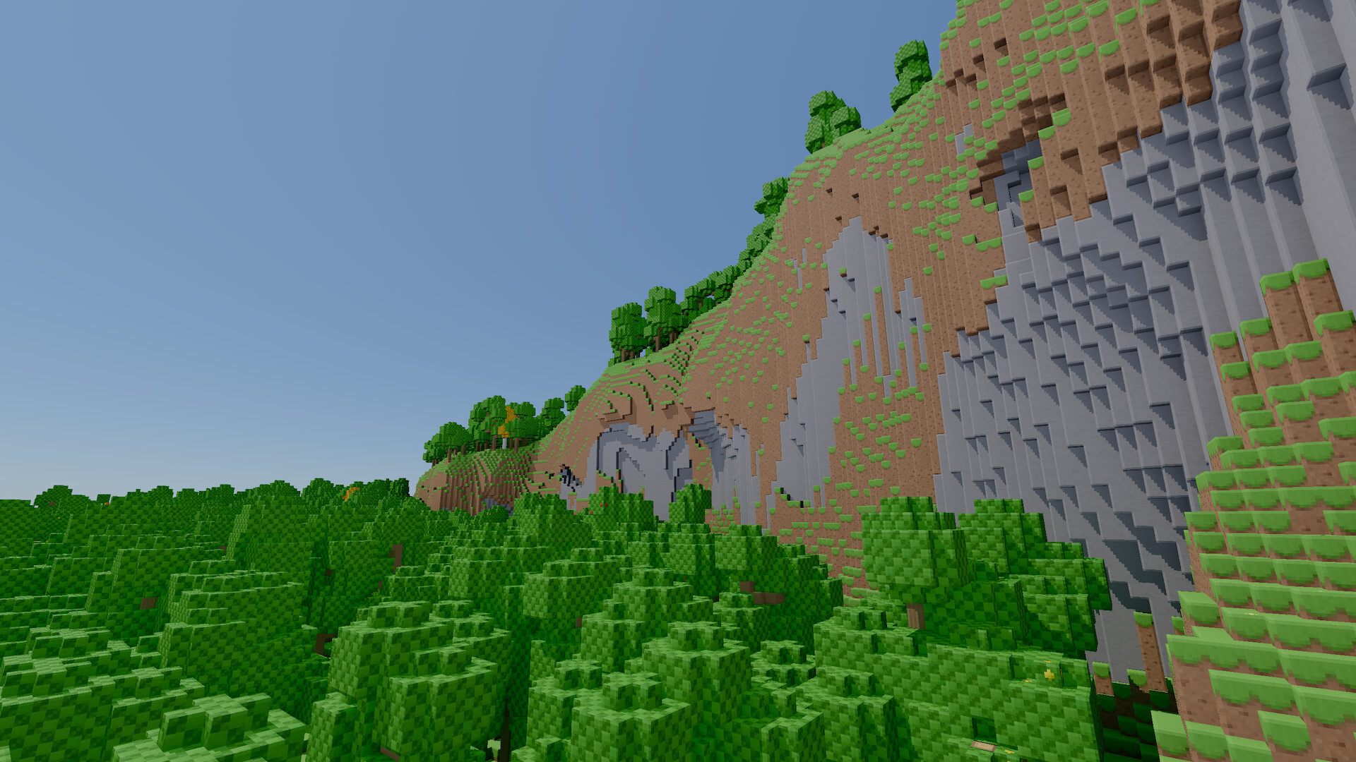 Cliffs tower over a forest